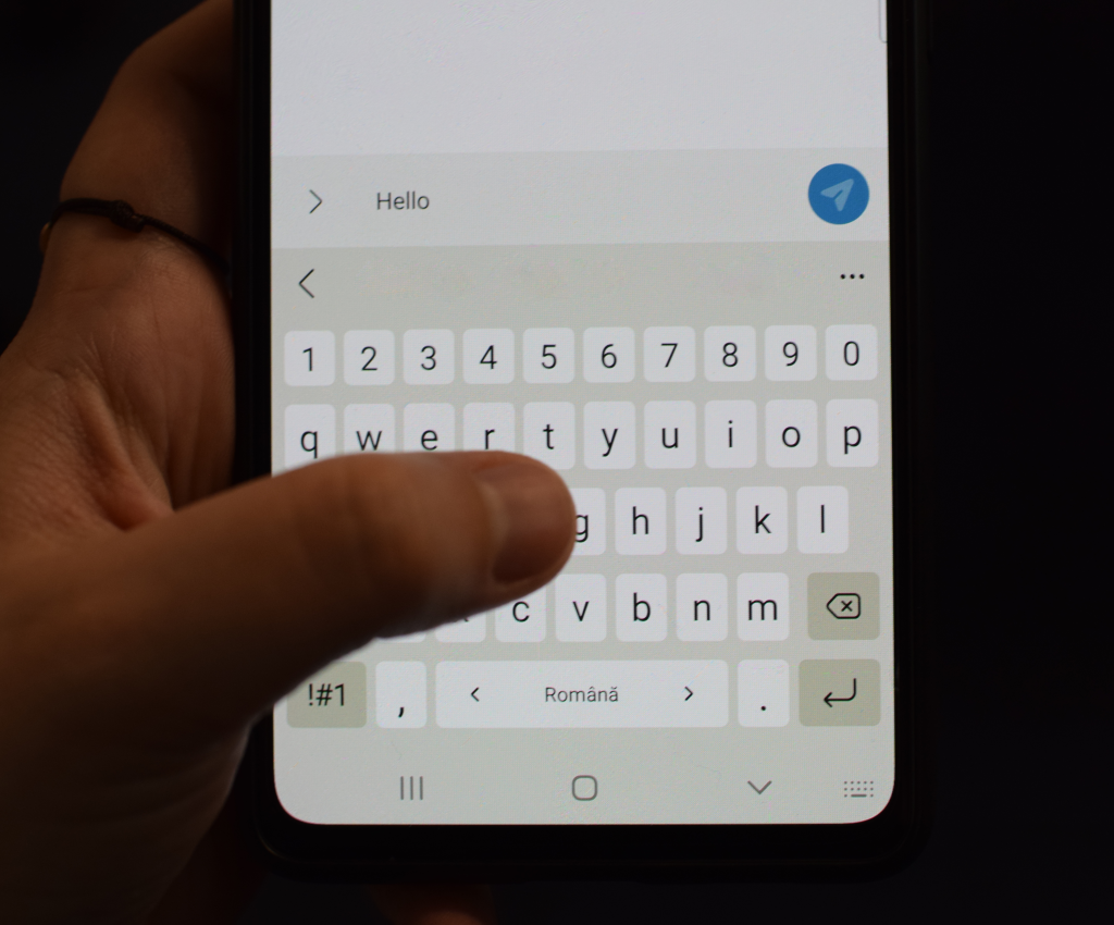 Typing on a touchscreen smartphone keyboard